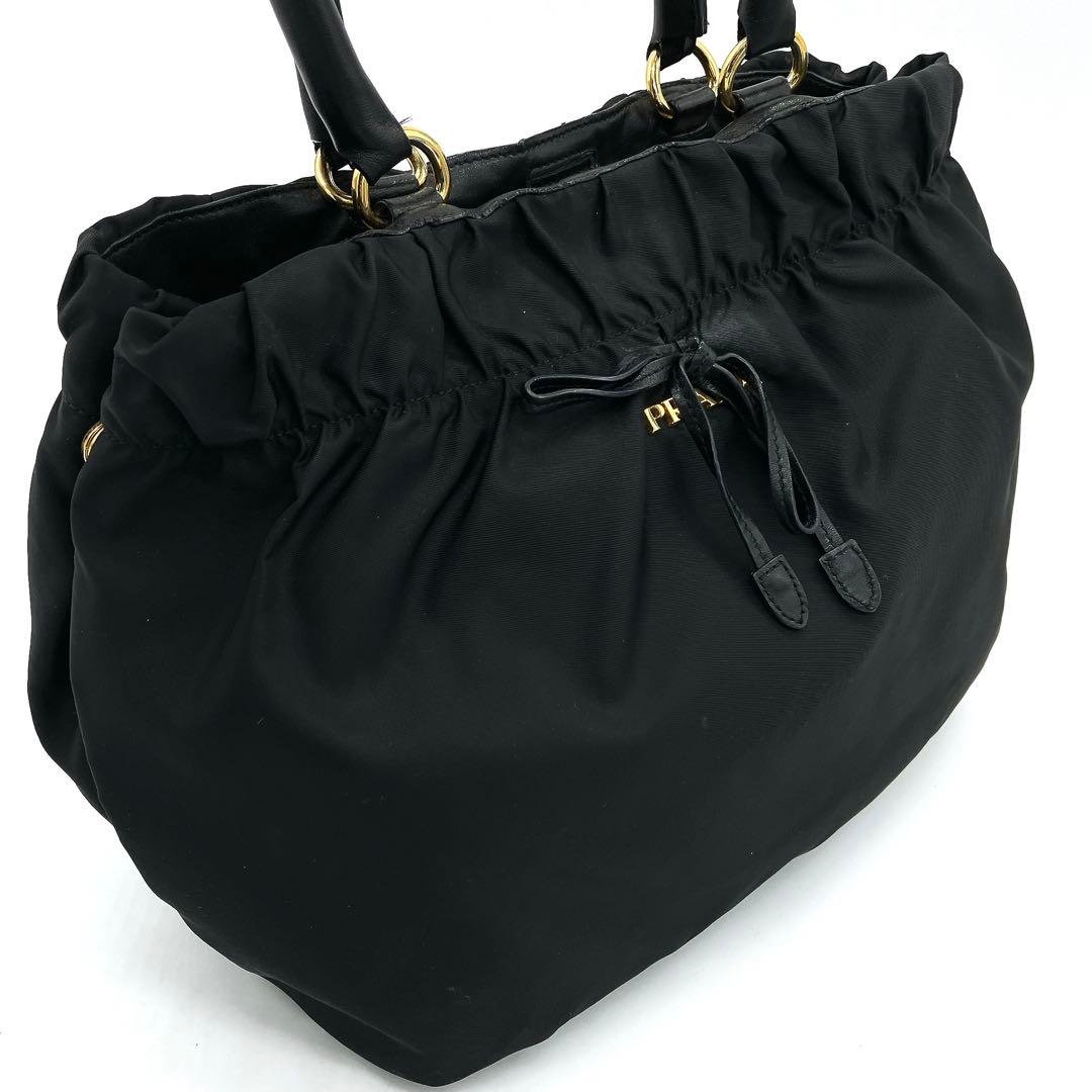 【PRADA】ハンドバッグ　リボン　ロゴ金具　ゴールド金具　ナイロン　ブラック