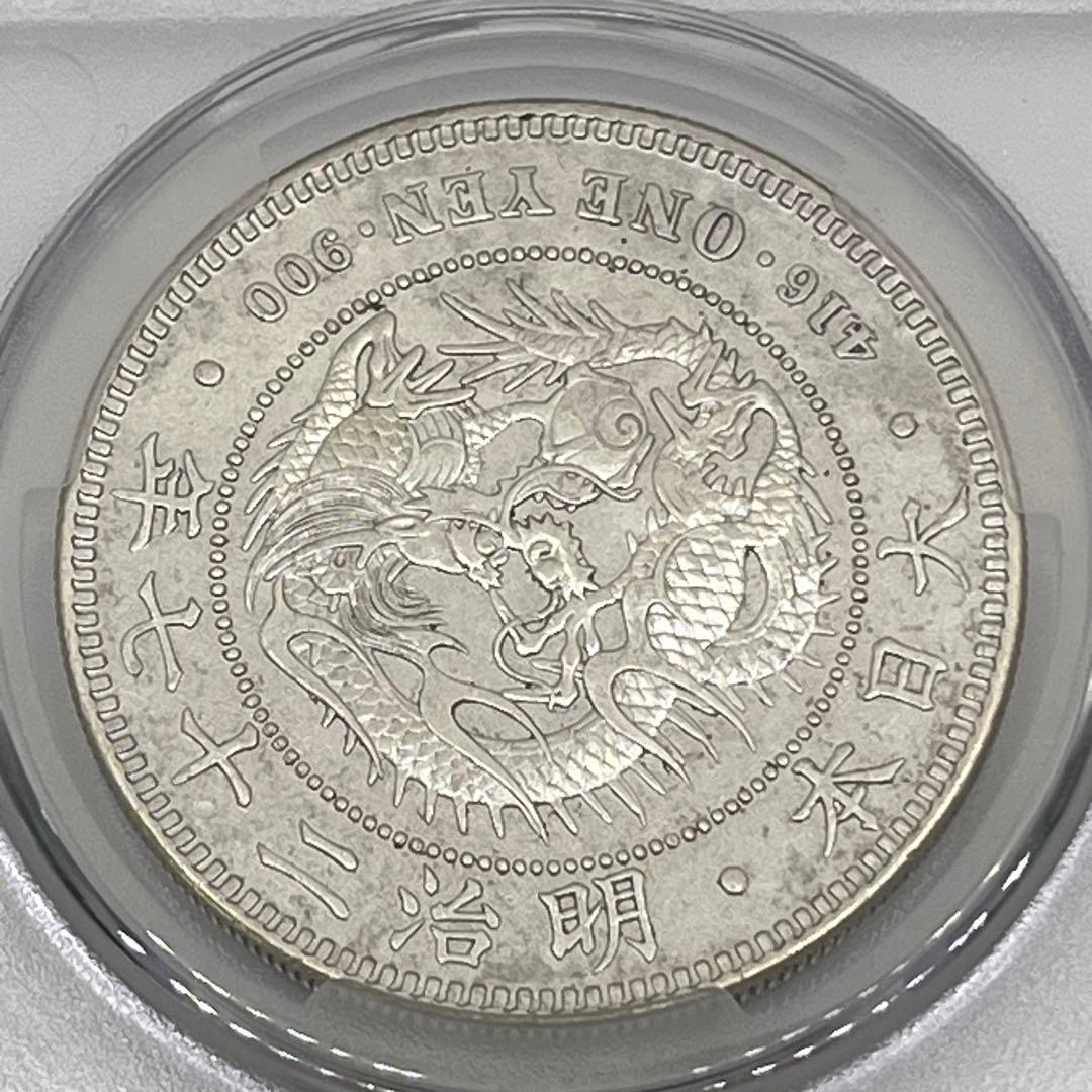 CAG HARSHLY CLEANED XF D 明治27年 左丸銀 新一円銀貨