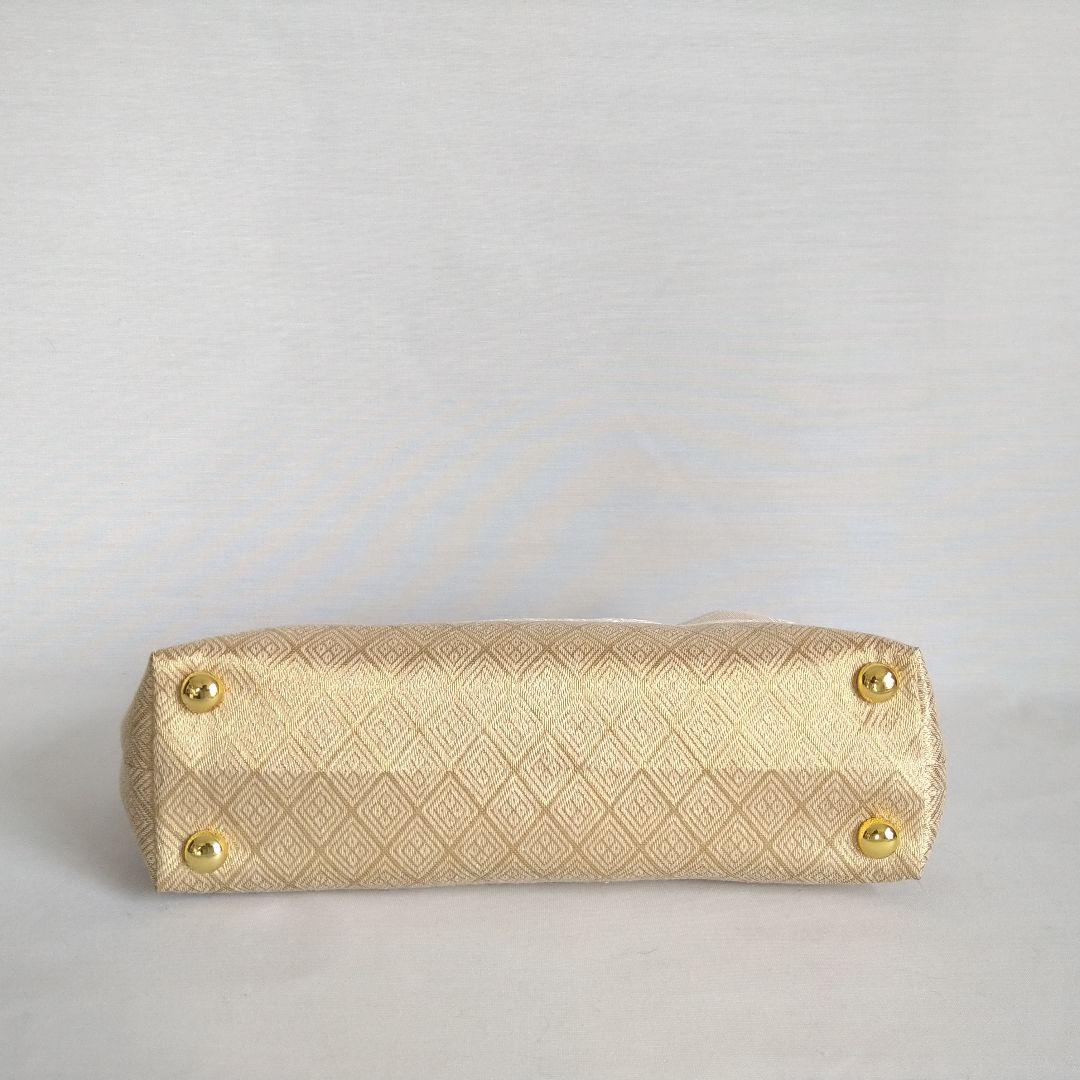 博多献上柄帯リメイク アイボリー✕ゴールド バネハンドルバッグ