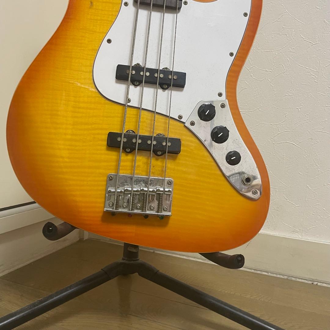 s*m様 メーカー不明　オレンジエレキベース 4弦