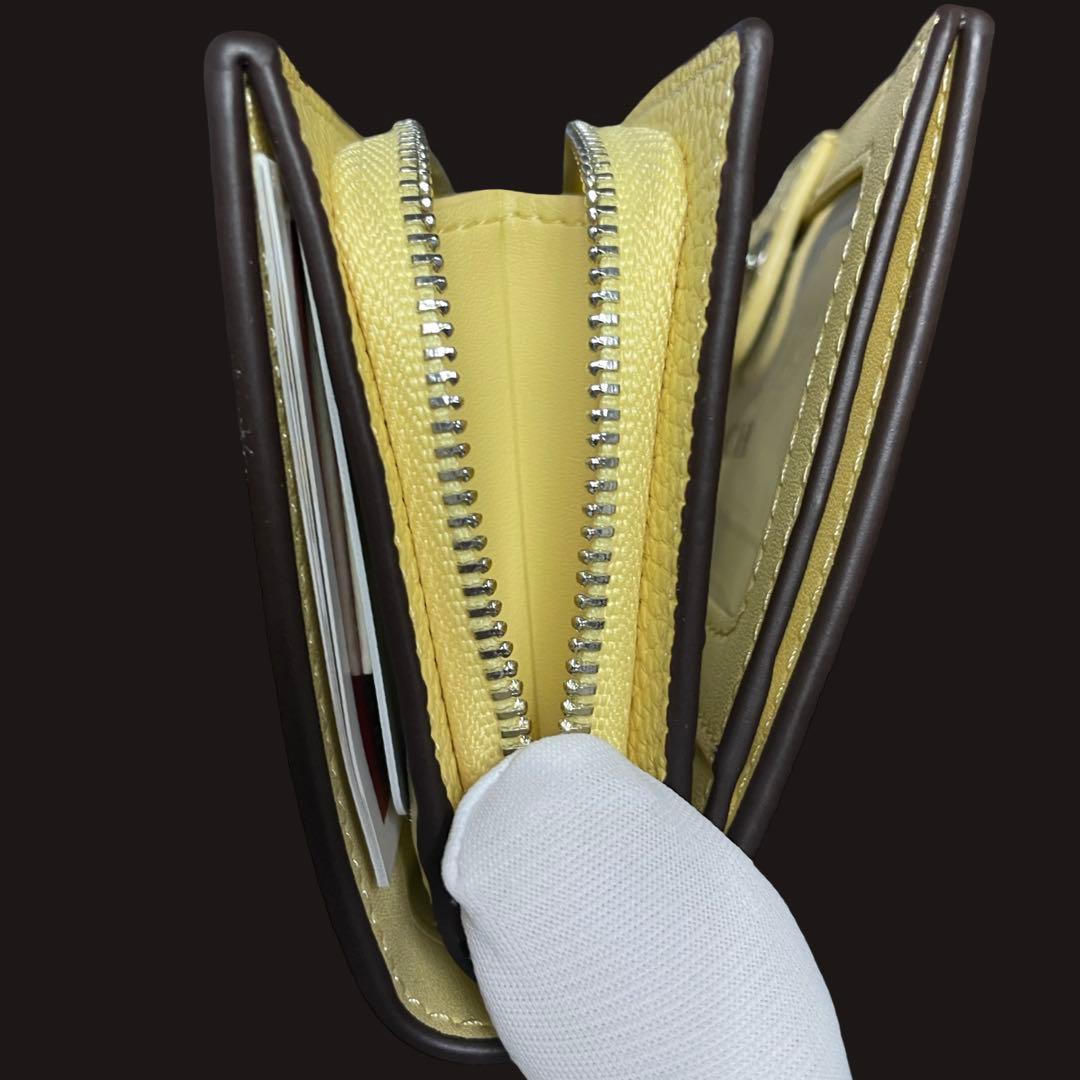 コーチ　スヌーピー　二つ折り財布　チャーリーブラウン