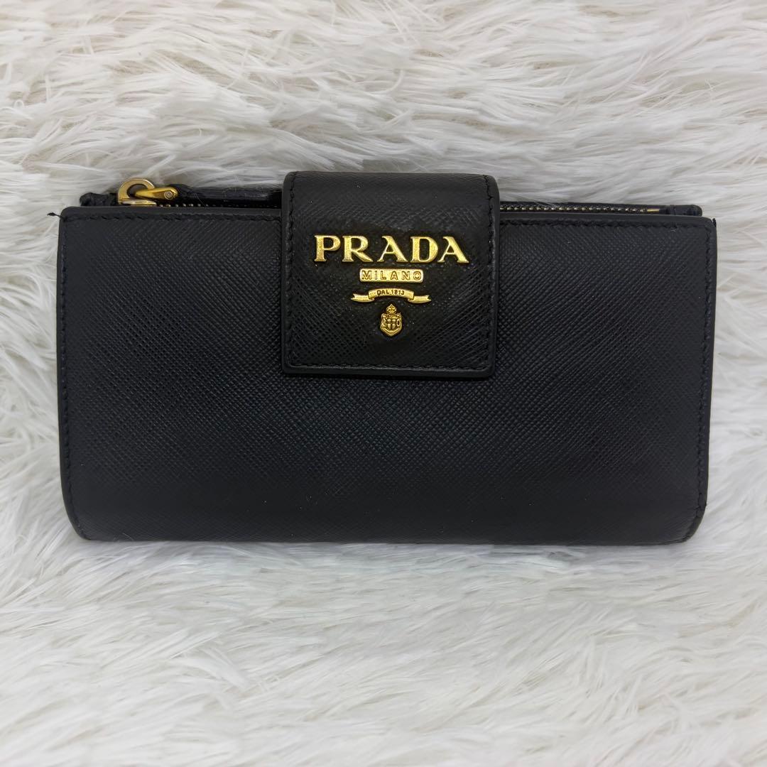 美品✨プラダ 長財布 折り財布 サフィアーノ レザー ロゴ金具 ブラック