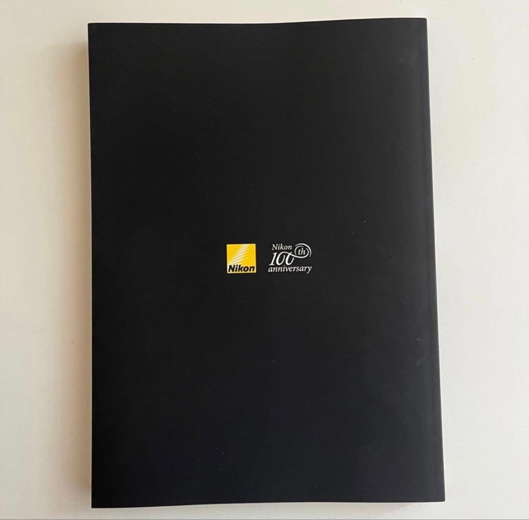 スワロフスキー ニコン100周年記念 キーホルダー　社史