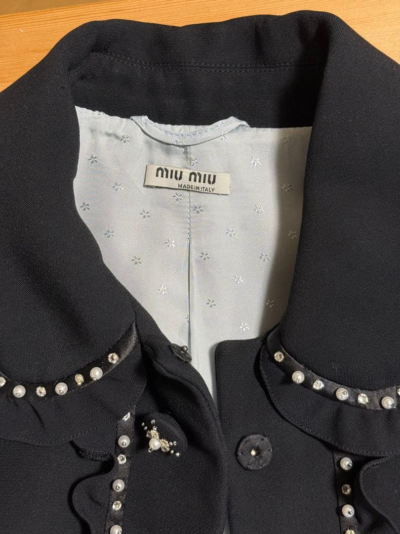 Xmasセール: miu miu ミュウミュウ フリル付き黒チェスターコート