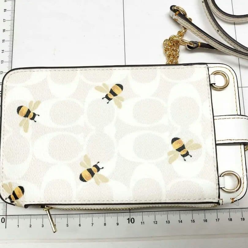 美品 COACH フォーンクロスボディ 蜂柄 スマホショルダー d27