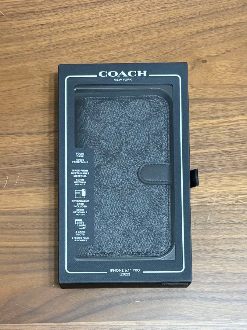 COACH iPhone14PROケース フォリオ・シグネチャー キャンバス
