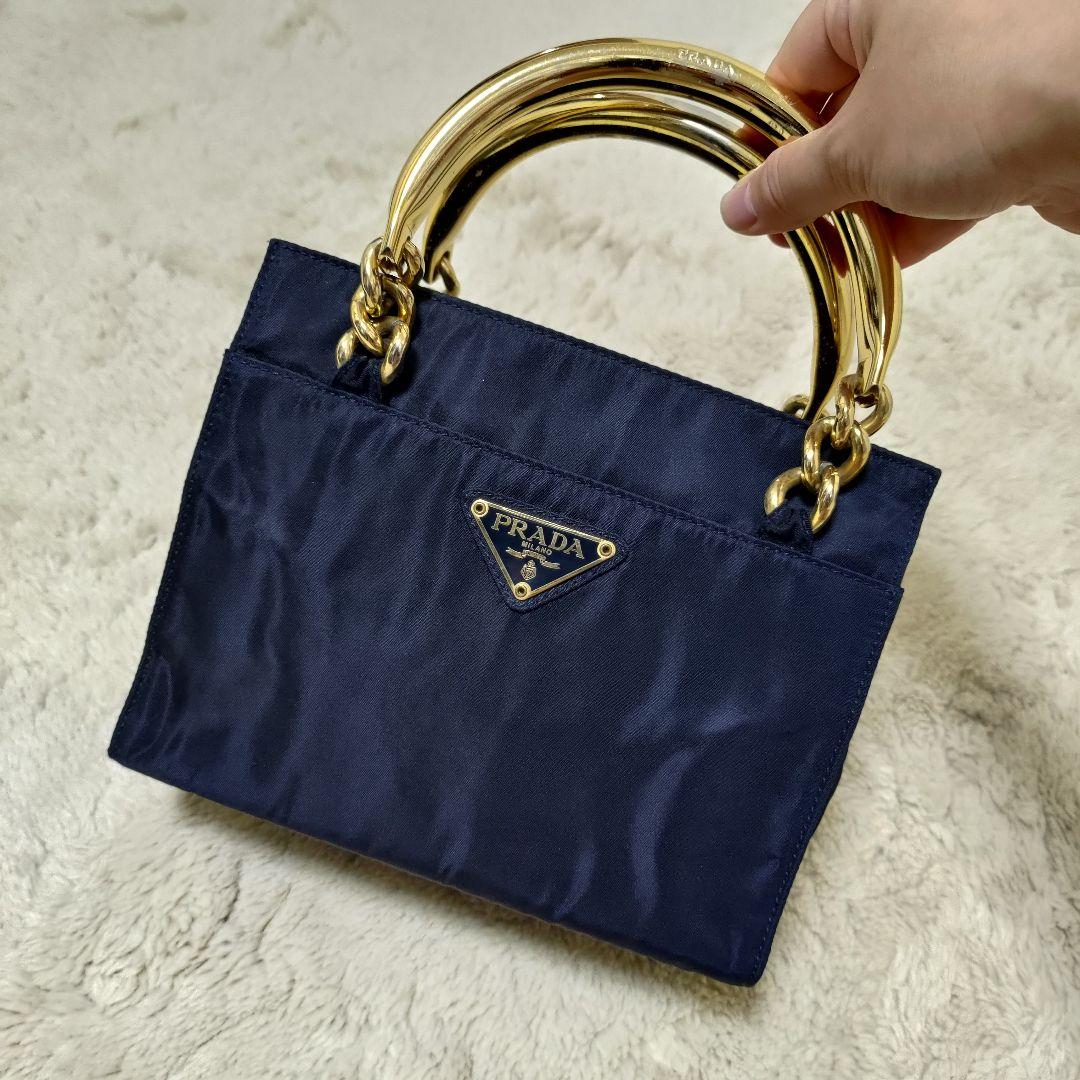 PRADA トライアングルロゴ ミニハンドバッグ ブラック ゴールド