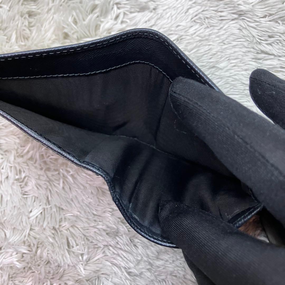 美品✨PRADA サフィアーノ メタルロゴ 二つ折り財布 フラップ ブラック