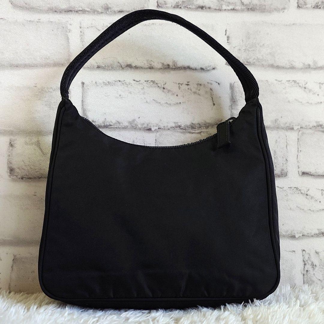 プラダ アクセサリーポーチ ミニハンドバッグ 三角ロゴ ブラック レディース