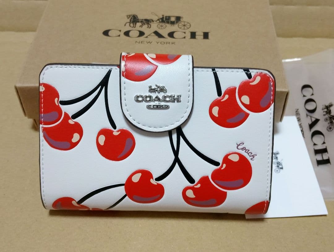 【オープン価格】COACH チェリー柄 二つ折り財布
