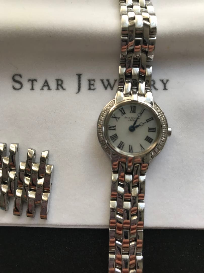 スタージュエリーのソーラー時計　ダイヤ0.13ct