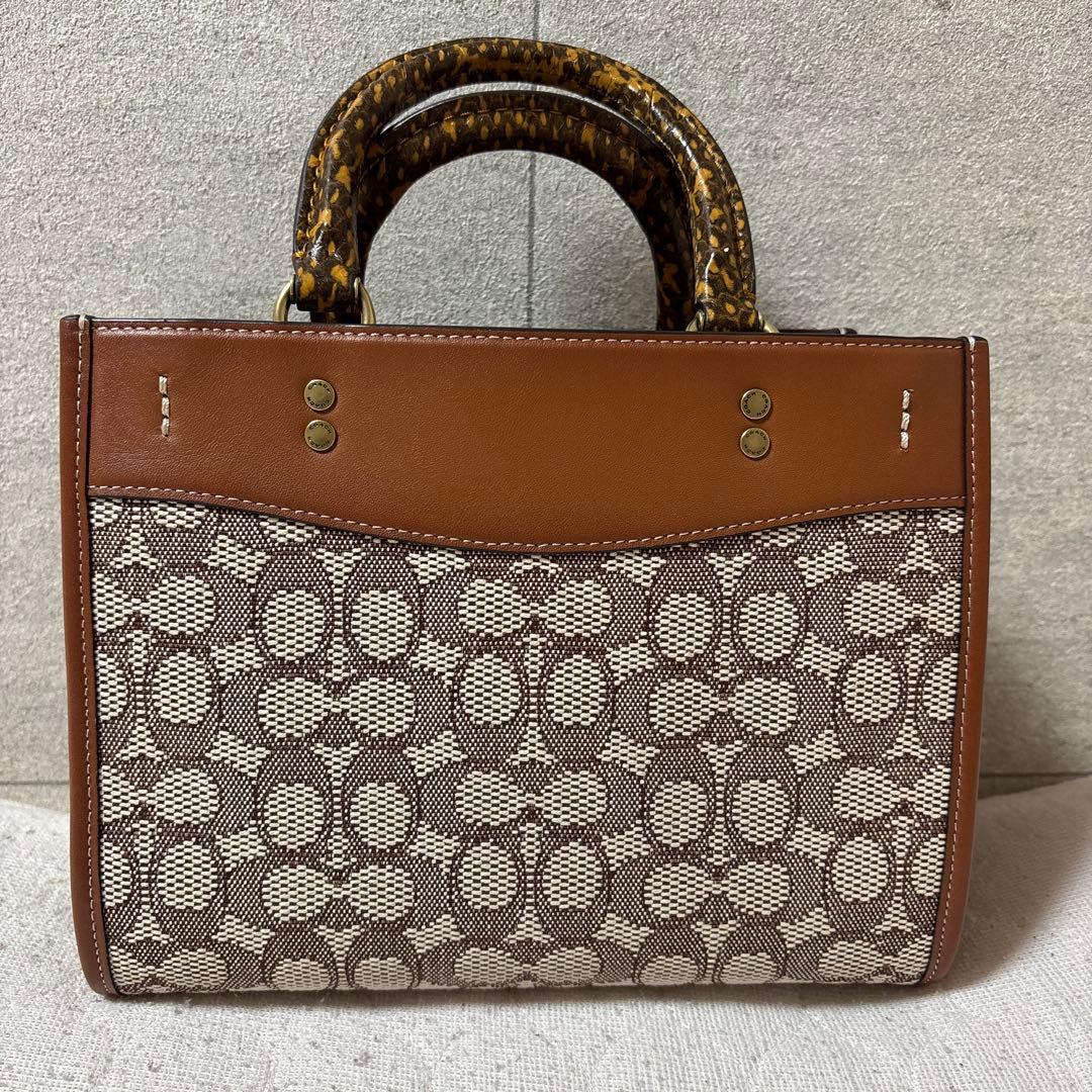 【お値下げ中】COACHローグ25 シグネチャーテキスタイル ハンドバッグ
