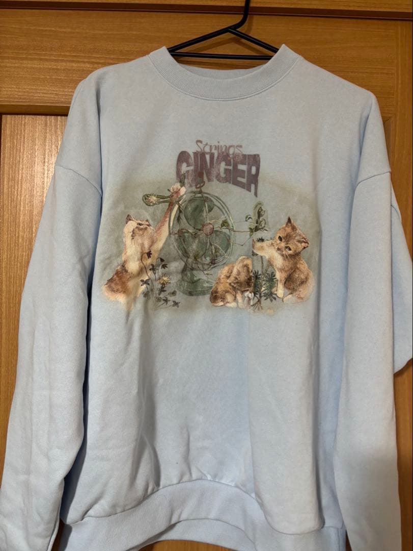 ずとまよ ジンジャーストリングスヴィンテージトレーナー (Milky Blue)