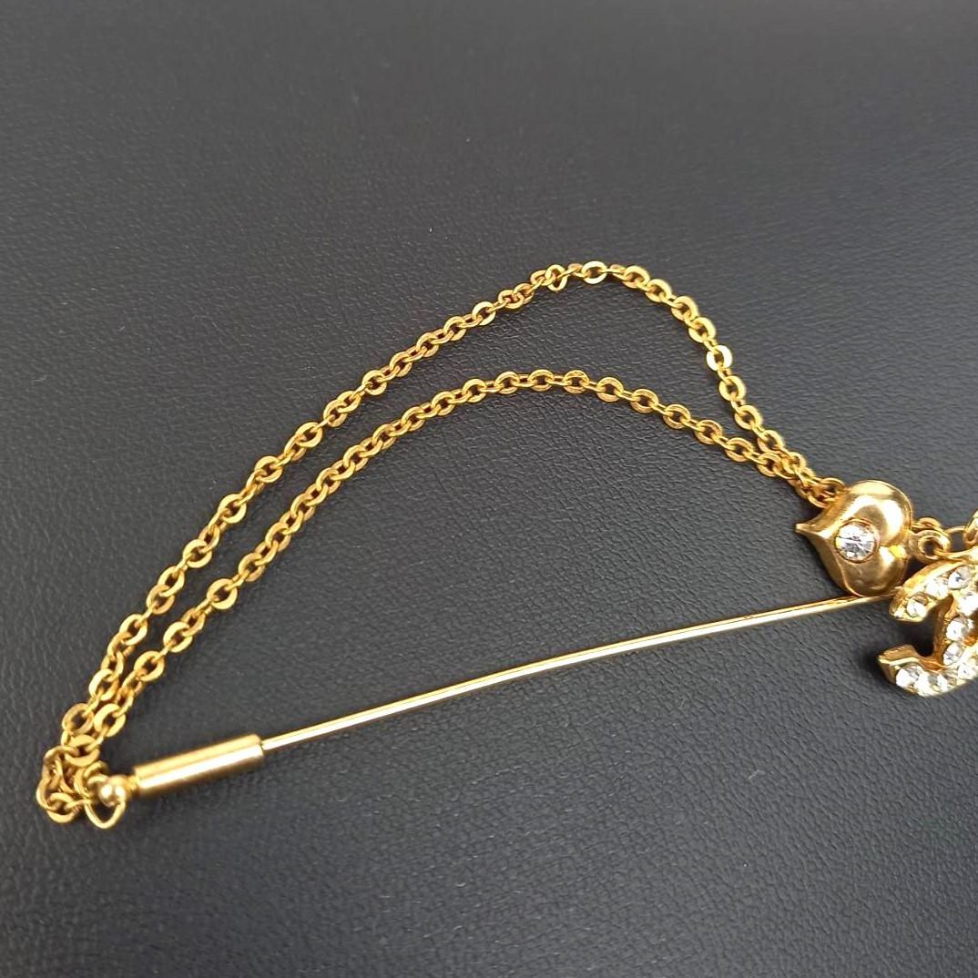 CHANEL シャネル ピンブローチ ゴールド ココマーク ラインストーン